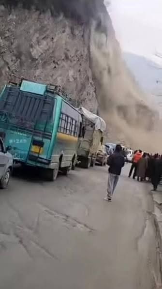 May be an image of train, motorcycle and road